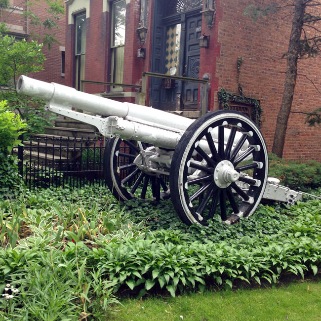 Howitzer cannon on front lawn in Wicker Park
