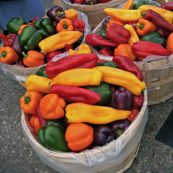colourful baskets of peppers at the St. Jacobs' Market