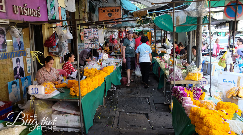 flower vendors line the street at Bangkok's Flower Market