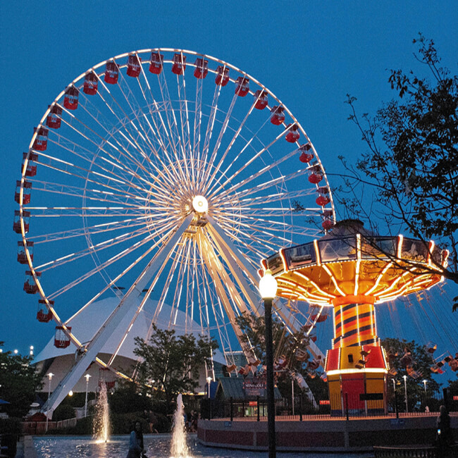 carnival rides at dusk on Navy Pier, Chicago