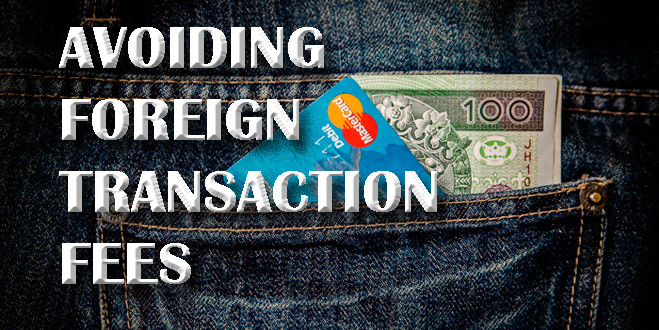 Cash and a credit card stick out of a back pocket. A title reads "Avoiding foreign transaction fees."